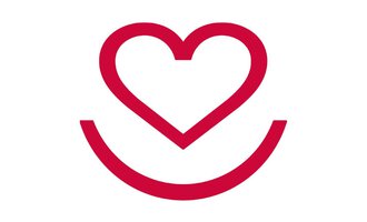 A simple, red symbol with a heart and a smiling face. It radiates joy and love. | © Krankenpflegeverein Kleinwalsertal Logo Gemeinde